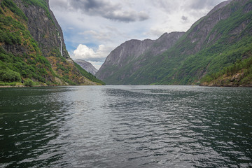 View of the Naeroyfjord seen from the jetty in Gudvangen.