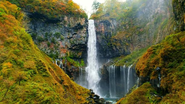 Kegon Waterfall in autumn trees colorful waterfall from lake Chuzenji in Nikko national park , against white isolated sky , Beautiful in autumn season at Tochigi,Japan
