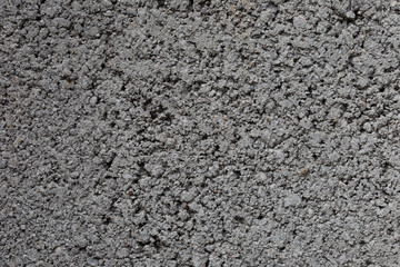 Surface of a cement block with expanded clay. Texture close-up.