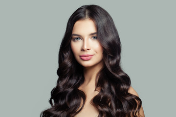 Naklejka premium Cute woman with healthy hair. Curly hair, haircare concept