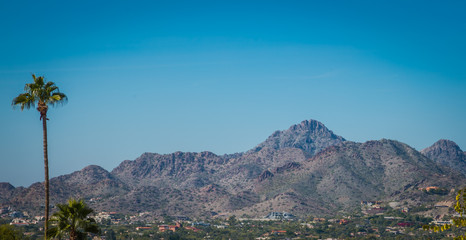 Neighborhoods at the base of tall mountains are rapidly growing in the Phoenix, Arizona area where population is steadily growing. Housing in these mountain base developments are usually more expensiv