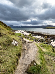 Fototapeta na wymiar Dramatic sky at coral beach on the Isle of Skye island in Scotland - UK