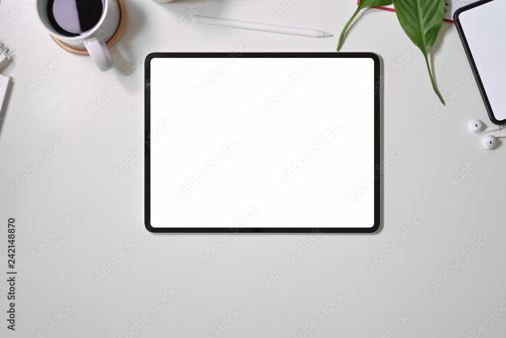 Poster top view digital display graphics tablet on white workspace desk table