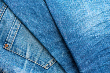 Blue jeans pile. Denim Texture.