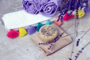 Spa and wellness setting with lavender flowers and handmade soap or shampoo bar, Dayspa nature set