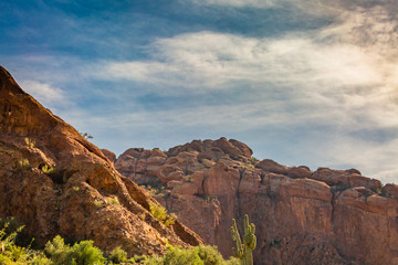 desert mountains tend to be made up of large boulders and rock that reflect the sun's light and atmosphere, making them unique and colorful with a glow in the Southwest USA desert