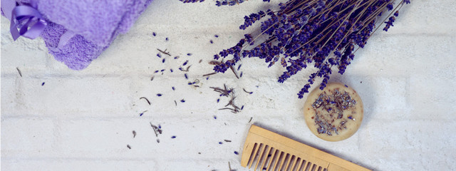 Spa and wellness setting with lavender flowers and handmade soap or shampoo bar, Dayspa nature set
