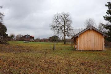 old barn in field