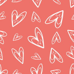 Quirky hand drawn soft cream doodle hearts on coral background as seamless vector pattern Great for Valentine. friendship gifts or decor for girls, giftwrap, scrapbooking and wedding items