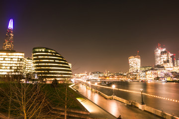 Fototapeta premium London Skyline at Night over the Chard and Thames River