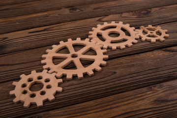 Old gears are assembled into a puzzle mechanism. Business concept idea, teamwork, cooperation. creative Innovations Industry