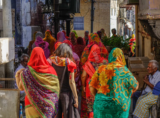 Women walking on street in Pushkar, India
