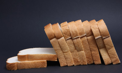 Soft bread with a black background.