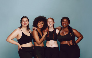 Diverse women embracing their natural bodies