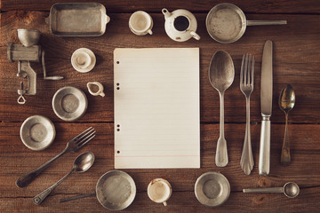vintage cookware on wooden board