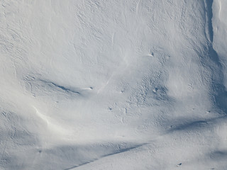 Aerial view of snow covered mountain with impressive structure
