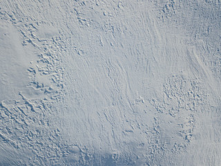 Aerial view of snow covered mountain with impressive structure