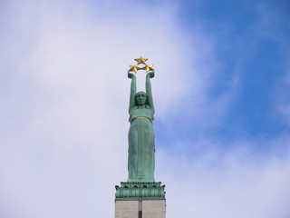 Famous landscape view of statue The Freedom Monument in Latvia Riga old town