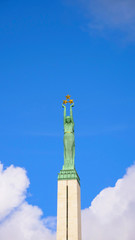 Famous landscape view of statue The Freedom Monument in Latvia Riga old town