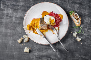 roasted Pike perch with vegetable noodles and egg. Close up, selective focus. Dietary menu. Fish...