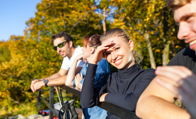 Group of friends on tourist trip looking at landscape