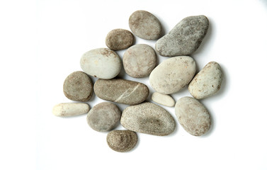 Fototapeta na wymiar sea round stones, pebbles on white isolated background