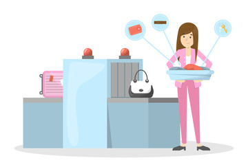 Woman standing in airport at conveyor belt