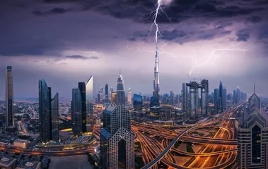 Wall murals Burj Khalifa Dramatic Dubai view of downtown with lightning