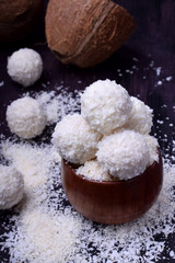 White sweets sprinkled with coconut flakes