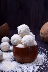 Fototapeta na wymiar White sweets sprinkled with coconut flakes