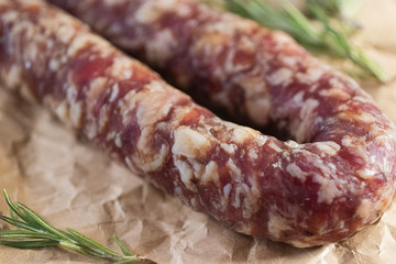 Homemade smoked sausage in a natural casing. Farm products concept.