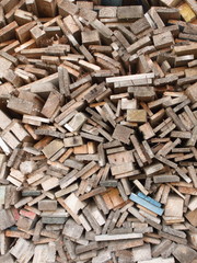 pile of wooden cut logs for fire close up