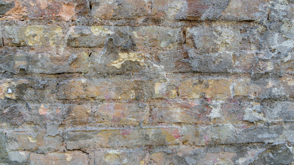 Red Brick  wall. Mediterranean style. Aged wall. Concrete and bricks.
