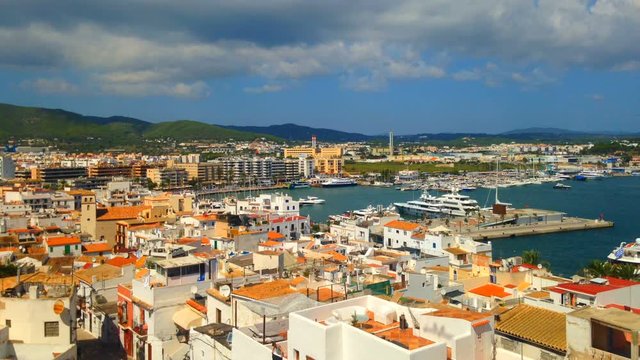 Cinemagraph - Clouds floating over the port of the Town of Ibiza on Ibiza Island.