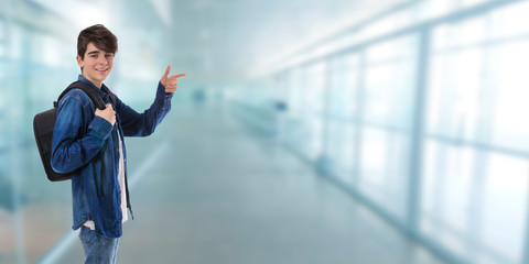 student at school with the backpack pointing