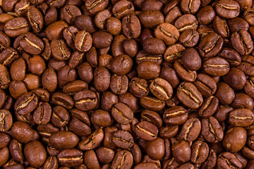 Background of many roasted coffee beans