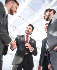 Fototapeta premium handshake business partners standing in the office