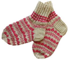 Hand knitted handmade warm winter wool woolen sock accessory with pink pattern isolated on the white background 