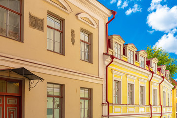 Tallinn in Estonia, colorful houses in the medieval city, typical buildings 