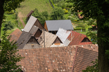 Traditional eastern europe rural architecture in countryside. Rural scene of old houses in village.