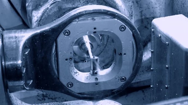 Milling abutment close-up. Cutting and milling of titanium abutment crown base for dental implant. Modern technology cad cam