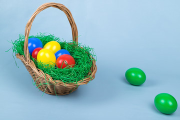 Plastic easter eggs on light blue background