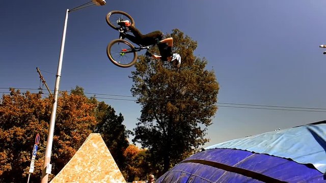Bike acrobatics teen boy
