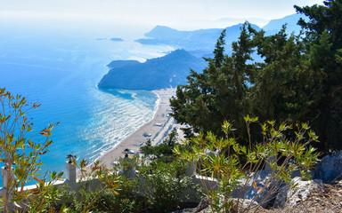 Fototapeta premium PANAGIA TSAMPIKA,RHODES/GREECE NOVEMBER 3 2018 :view of Tsampika beach from the top of the mountain