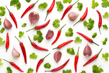 Vegetable and spices isolated on white background, top view. Wallpaper abstract composition of...
