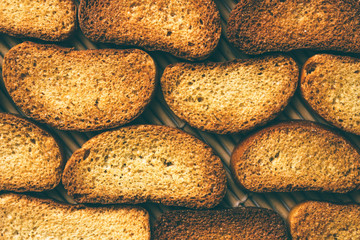 Delicious dried mustard bread. Bread slices on bamboo mats.