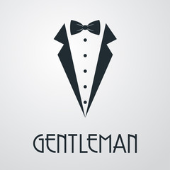 Logotipo con texto GENTLEMAN con corbata de lazo y solapas de chaqueta en fondo gris