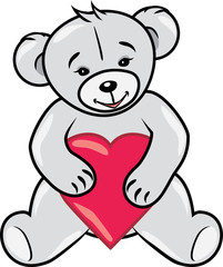 Obraz na płótnie Canvas Teddy bear holding a heart