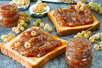 Fresh toasts with white currant jam.