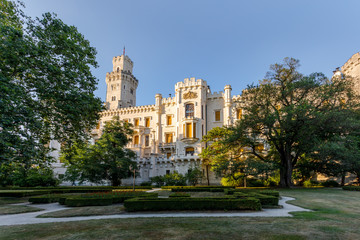 Fototapeta premium back view of beautiful white renaissance state castle castle Hluboka nad Vltavou, one of most beautiful castles in the Czech Republic